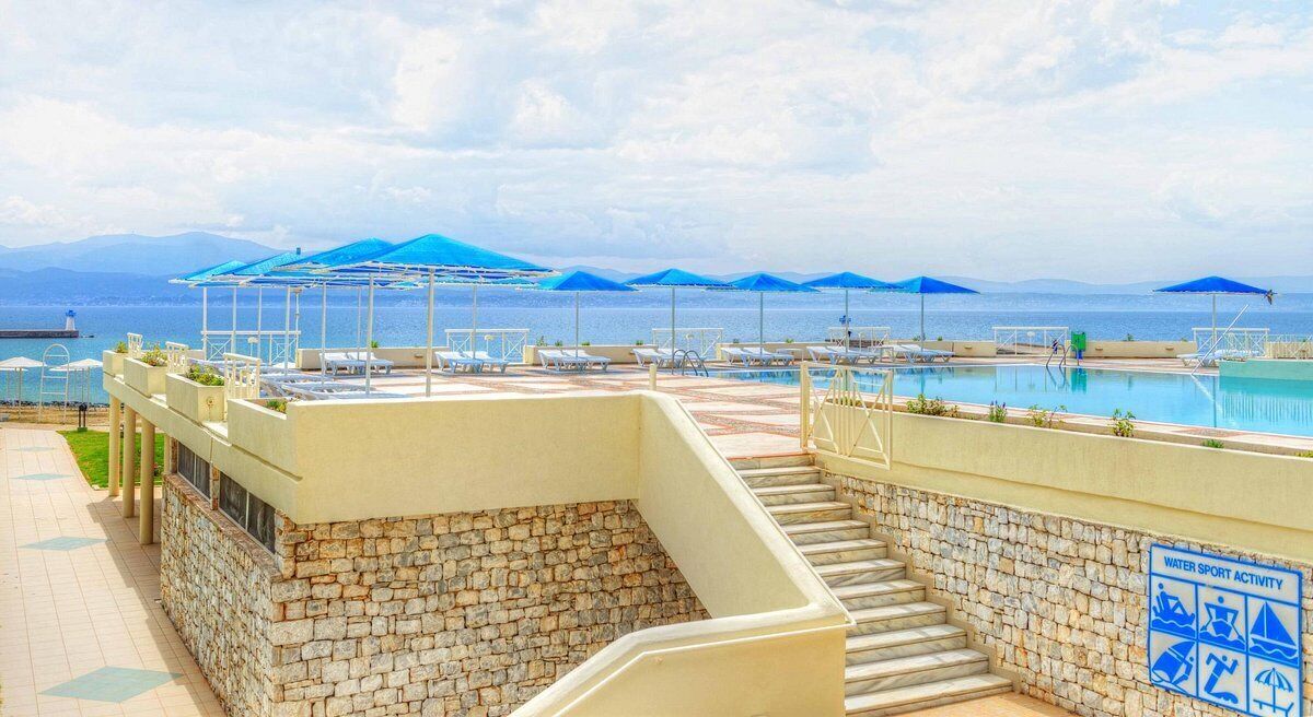 seasonal outdoor pool, pool umbrellas, pool loungers