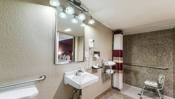 Chambre Deluxe, 1 très grand lit, accessible aux personnes à mobilité réduite (Roll-In Shower) | Salle de bain adaptée