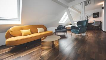 Junior Suite | Living area | Flat-screen TV