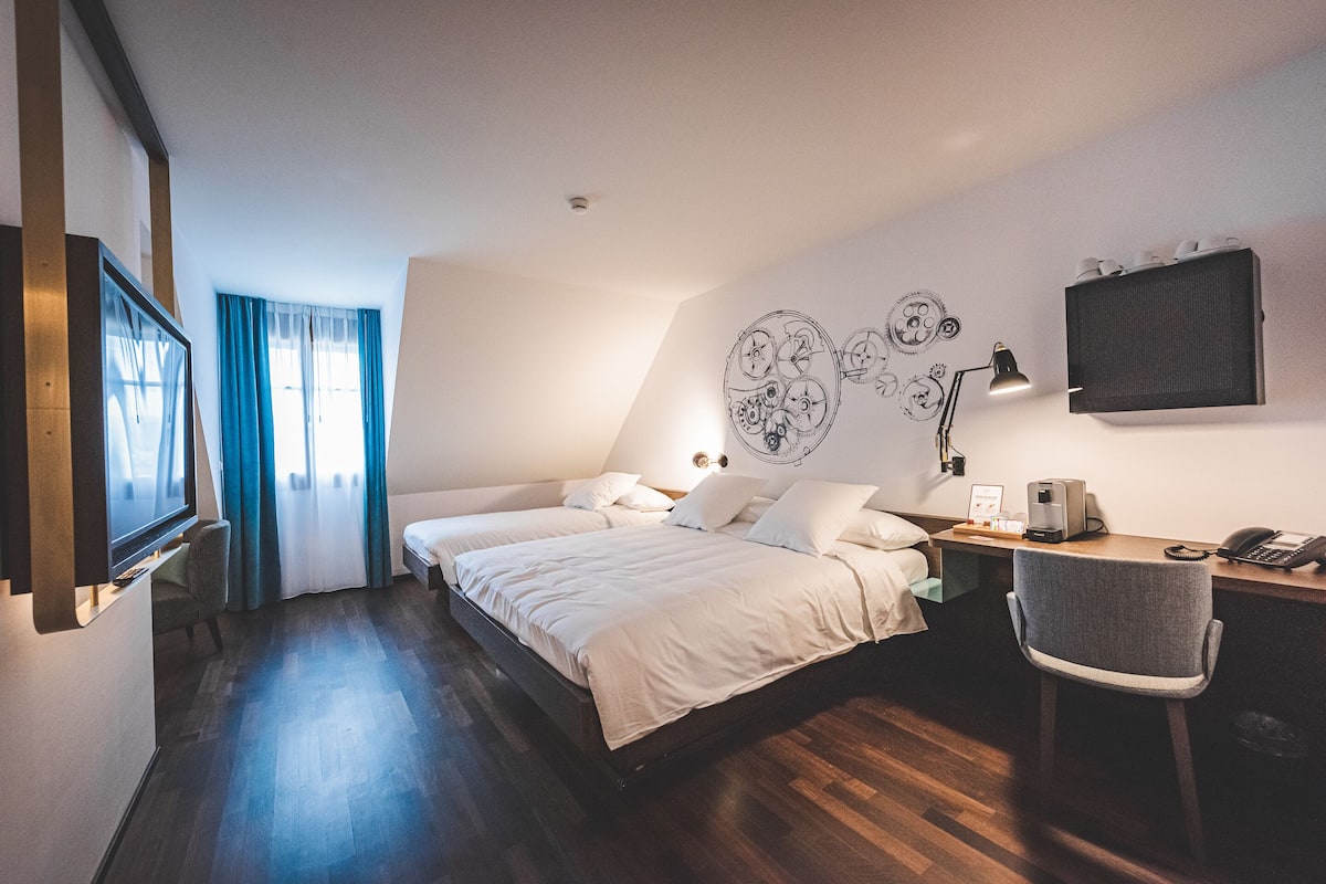 Superior Triple Room | Minibar, in-room safe, desk, soundproofing