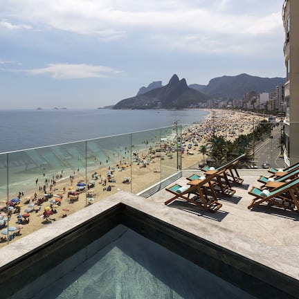 Outdoor pool, open 8:00 AM to 8:00 PM, sun loungers