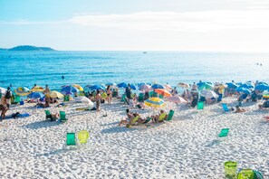 On the beach, beach umbrellas, beach towels