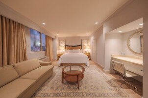 Executive Room | Living area | 25-inch TV with cable channels