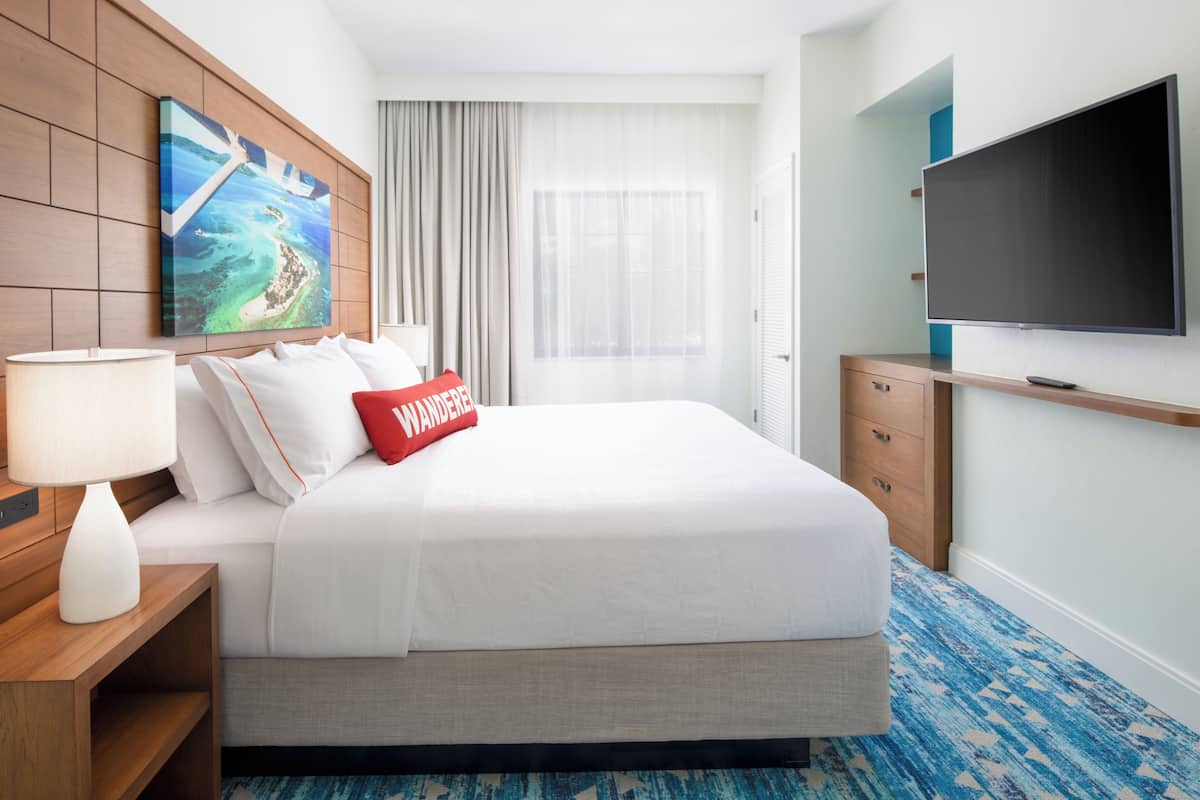 Desk, blackout curtains, iron/ironing board, bed sheets