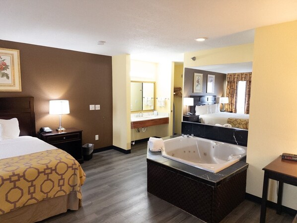 Suite, 1 King Bed, Balcony | Premium bedding, desk, laptop workspace, blackout drapes