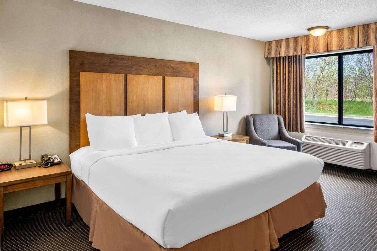Premium bedding, Tempur-Pedic beds, desk, laptop workspace