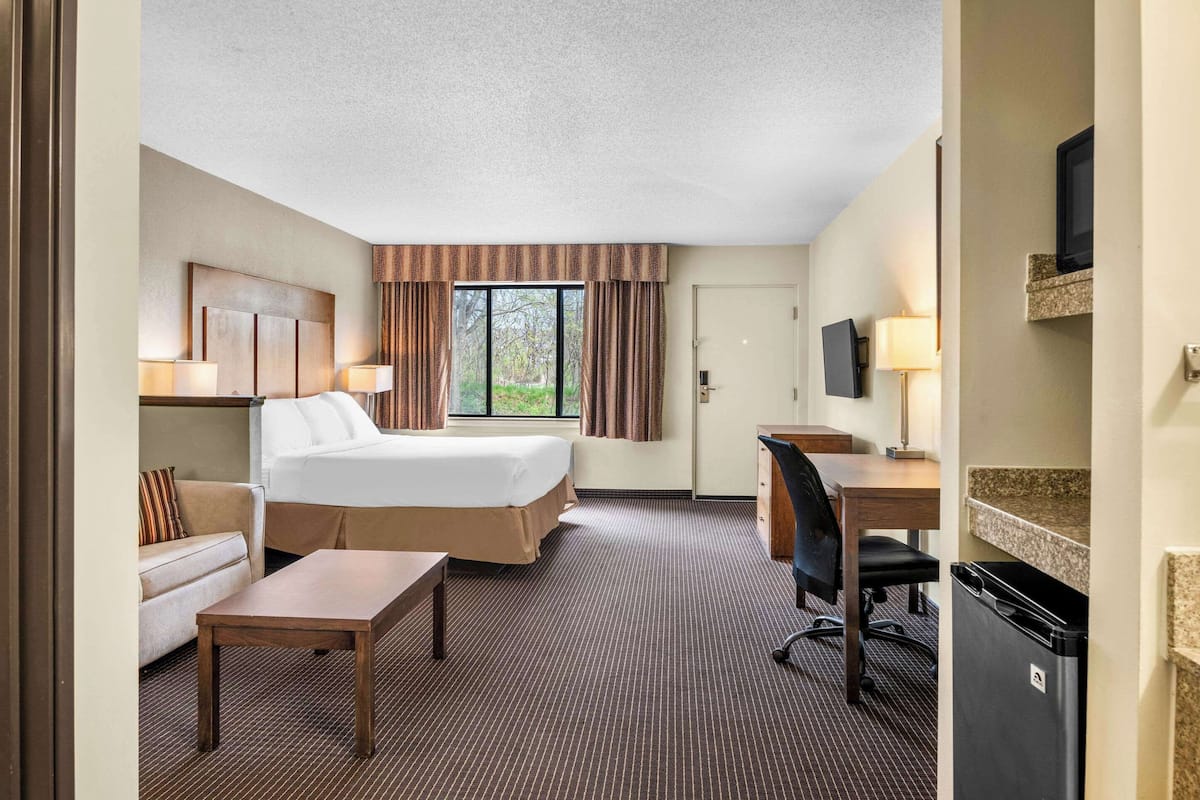 Premium bedding, Tempur-Pedic beds, desk, laptop workspace