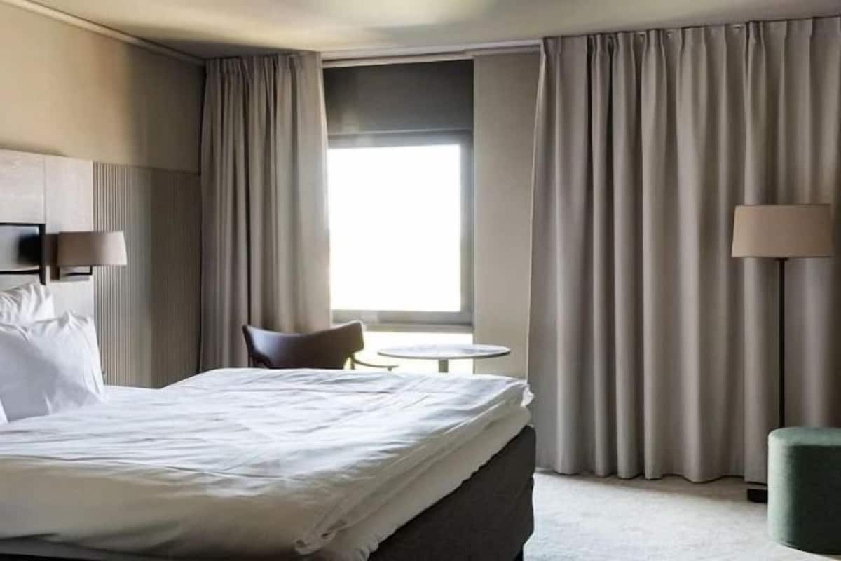 1 dormitori, matalassos amb encoixinament addicional i minibar