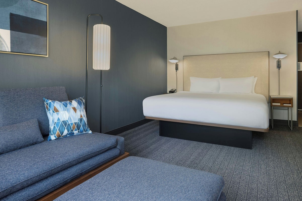 Room, 1 King Bed with Sofa bed | In-room safe, desk, iron/ironing board, free cribs/infant beds