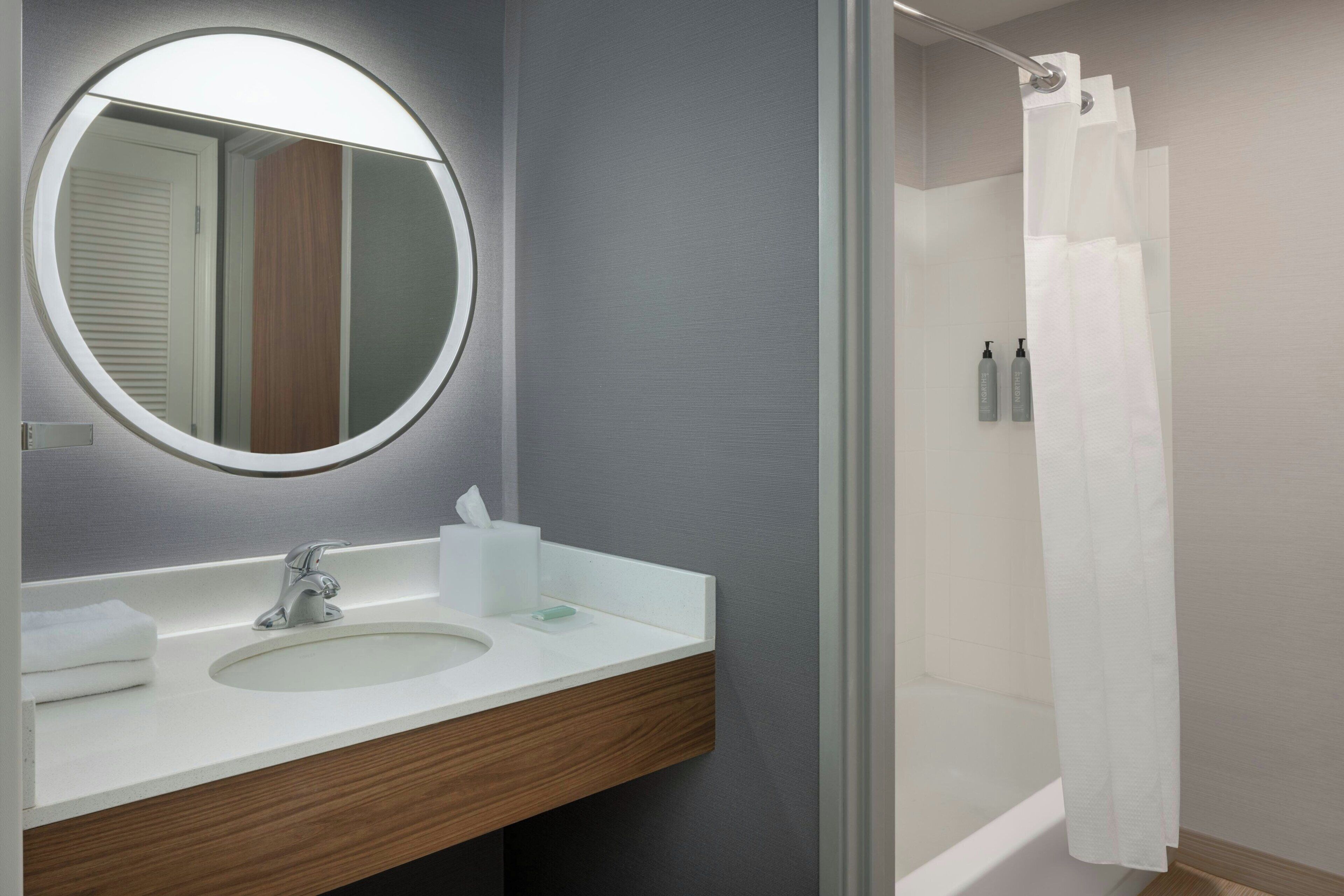 room, 2 queen beds | bathroom | free toiletries, hair dryer, towels, soap