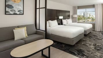 Suite, Multiple Beds, City View | Desk, blackout curtains, iron/ironing board, free cots/infant beds