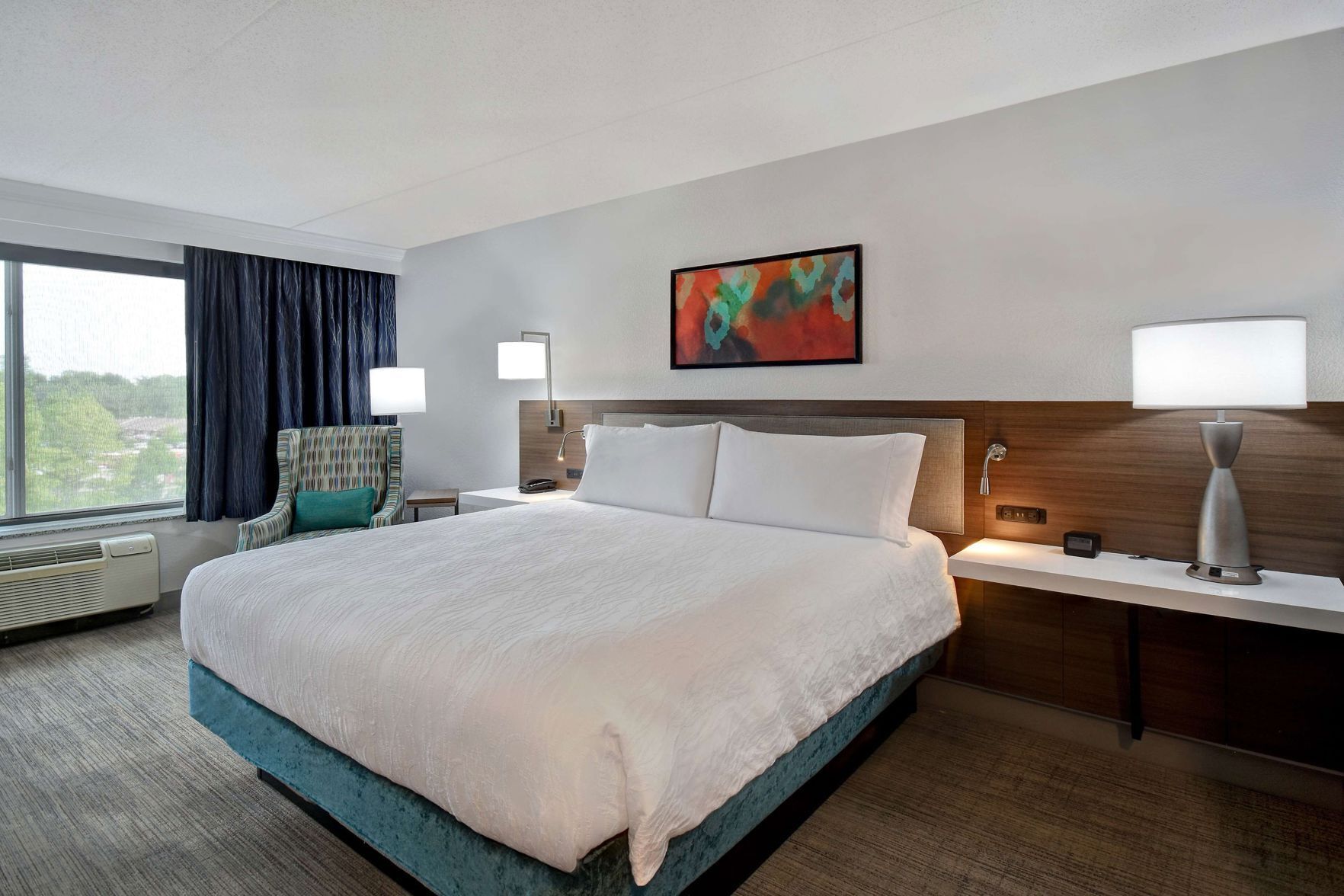 Desk, laptop workspace, blackout drapes, iron/ironing board