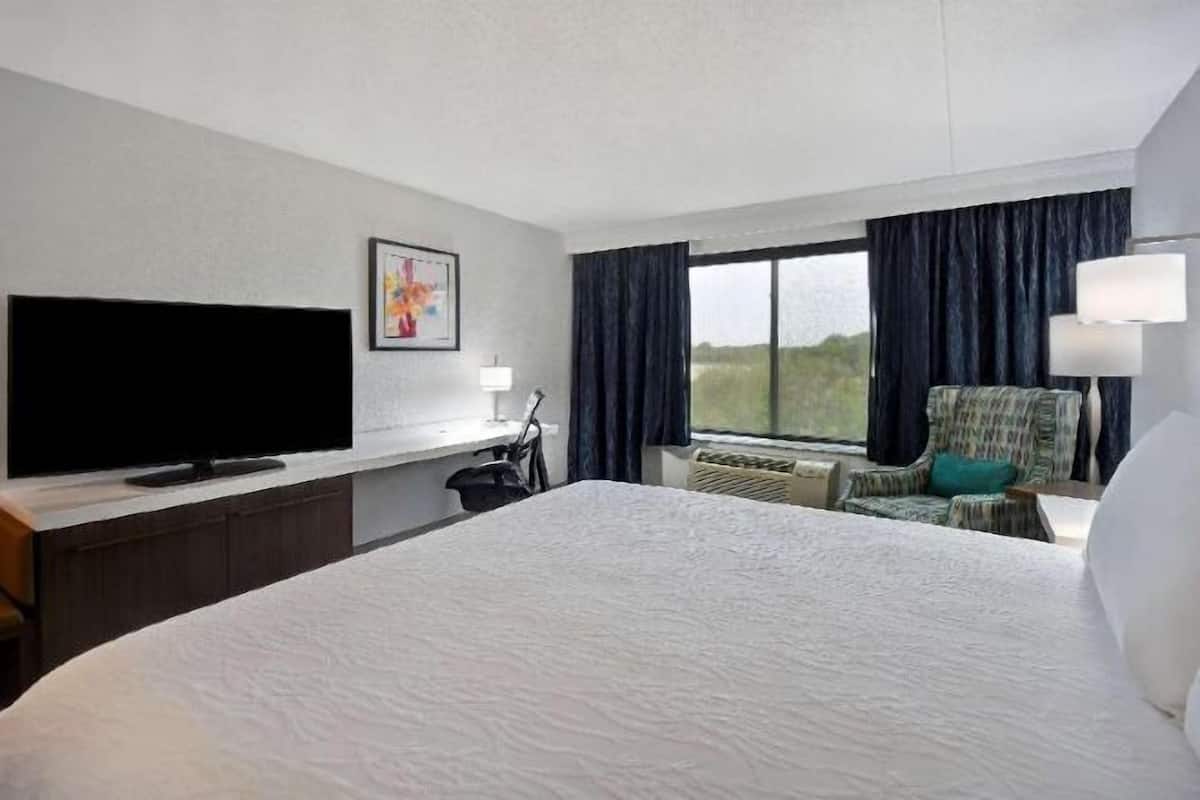 Desk, laptop workspace, blackout curtains, iron/ironing board