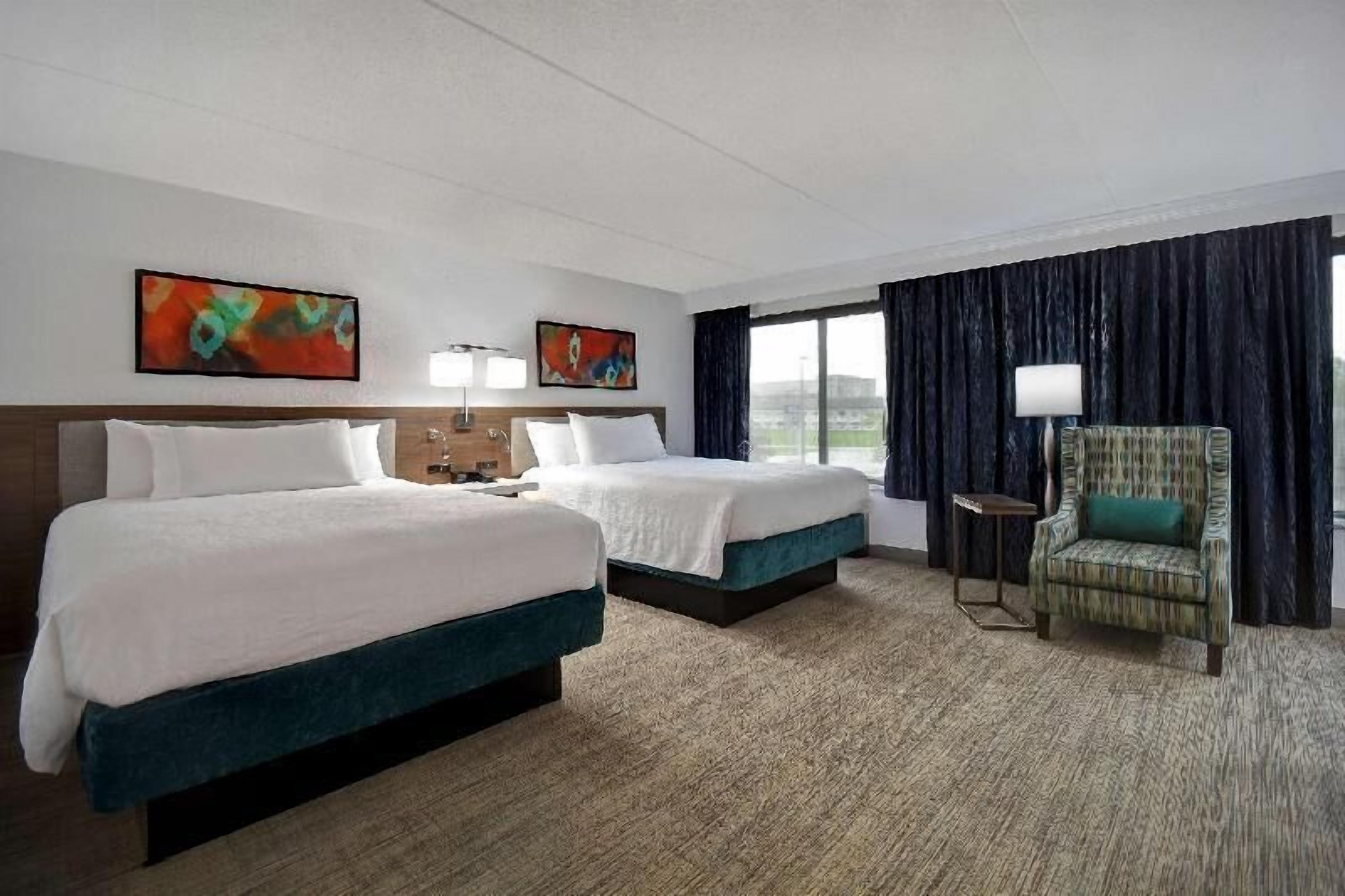 Desk, laptop workspace, blackout drapes, iron/ironing board