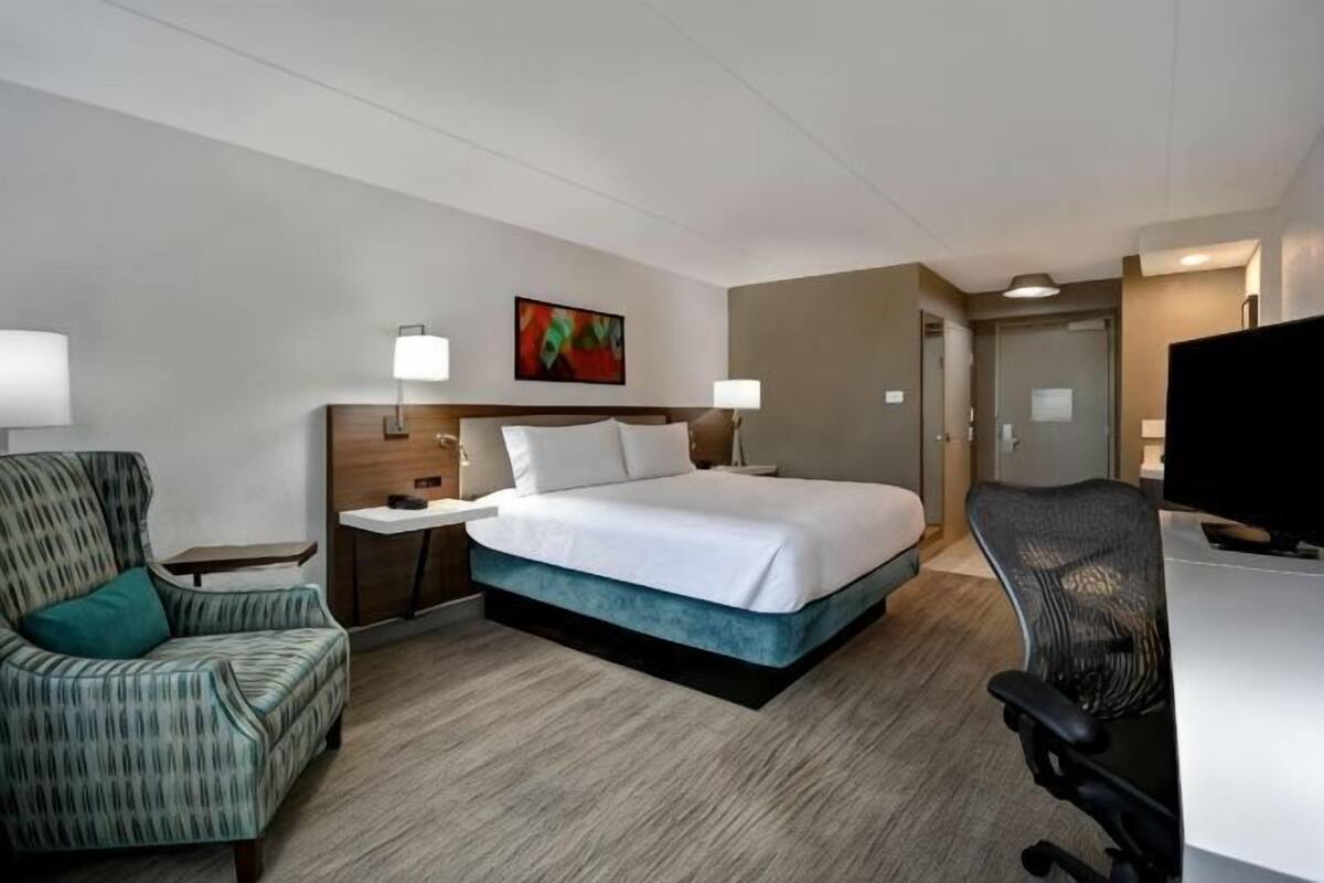 Desk, laptop workspace, blackout curtains, iron/ironing board