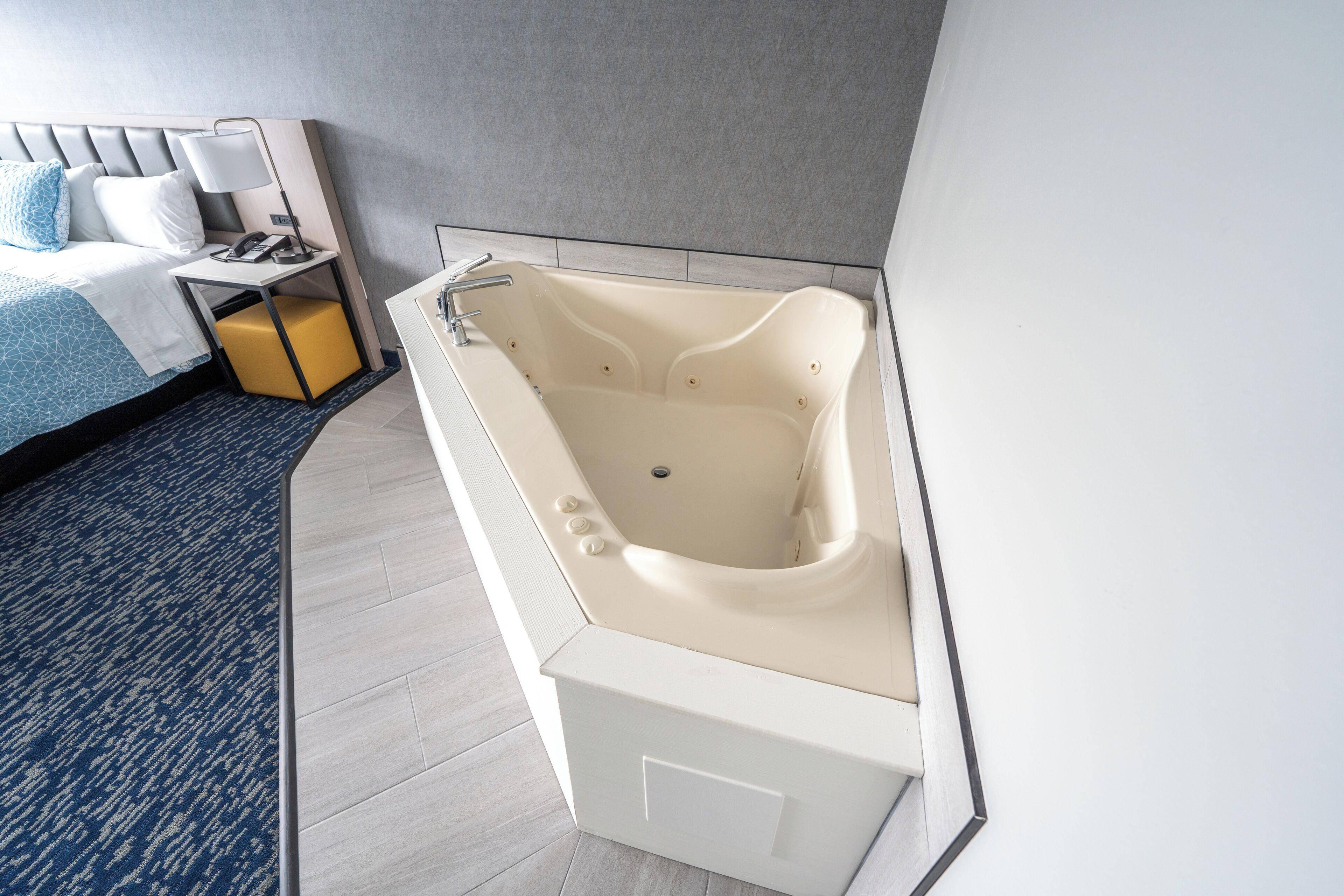 Premium Room, 1 King Bed, Hot Tub, Harbor View | Pillowtop beds, desk, iron/ironing board, free wired internet