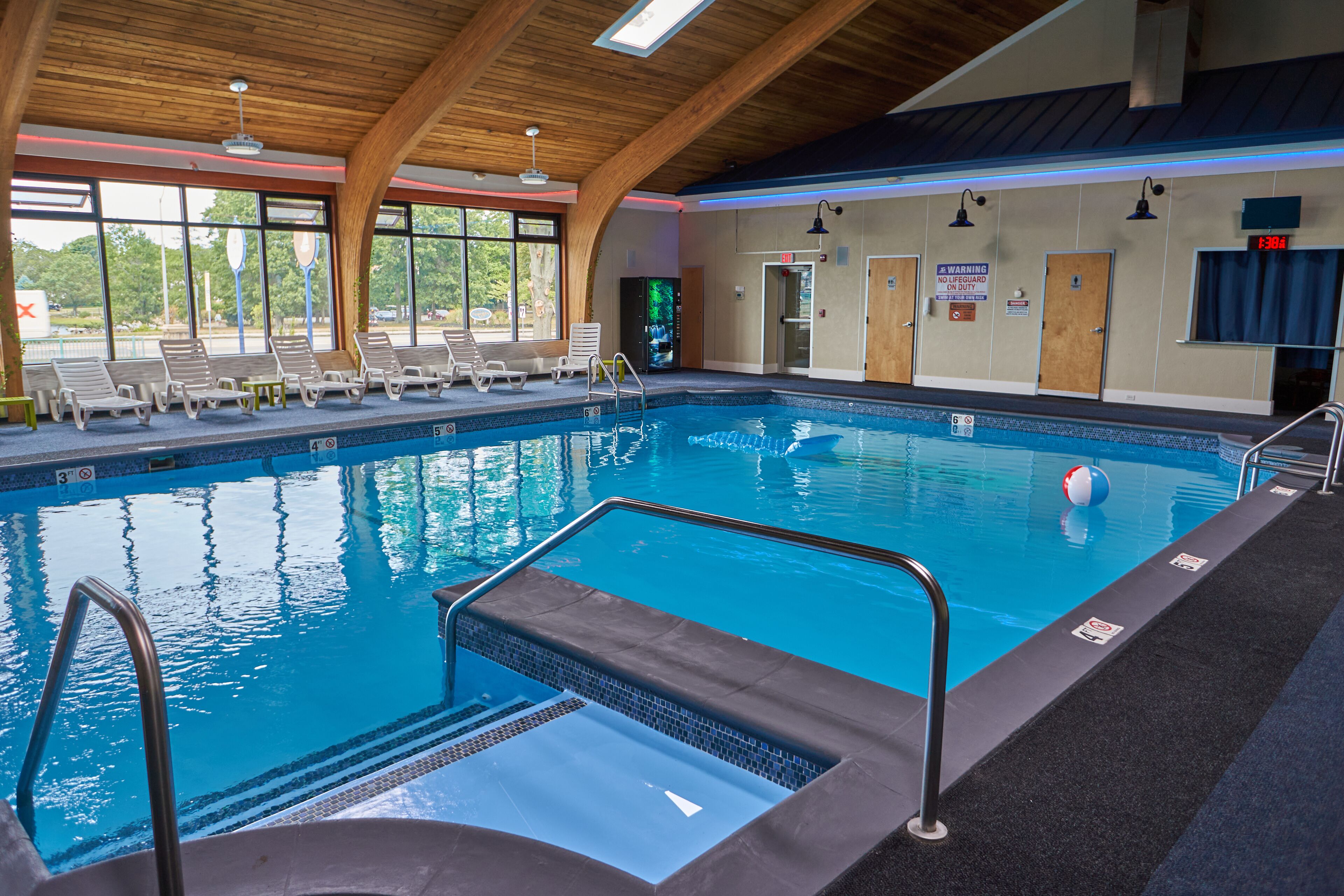 Indoor pool, open 9:00 AM to 8:00 PM, pool loungers