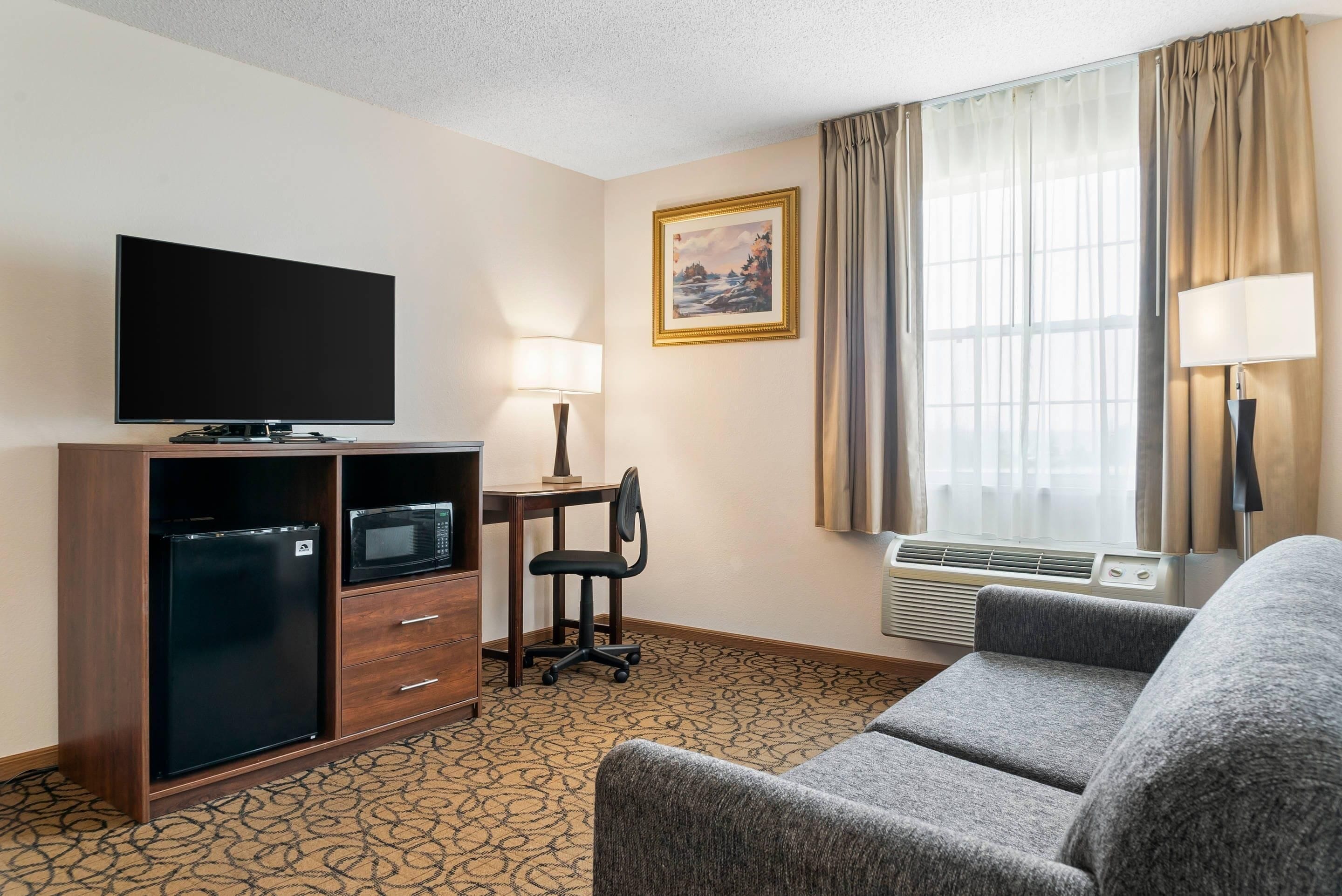 Pillowtop beds, desk, laptop workspace, blackout drapes