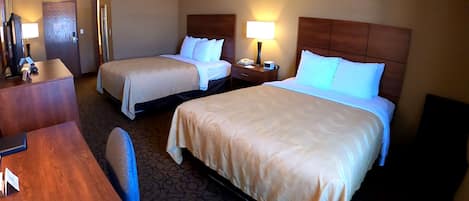 Habitación estándar, 2 camas Queen size, para no fumadores | Cortinas blackout, tabla de planchar con plancha y ropa de cama