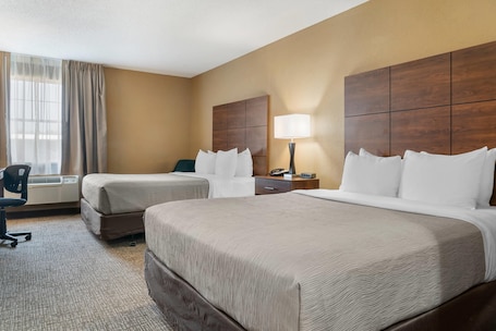 Standard Room, 2 Queen Beds, Non Smoking | Pillowtop beds, desk, laptop workspace, blackout drapes. Quality Inn & Suites Manistique