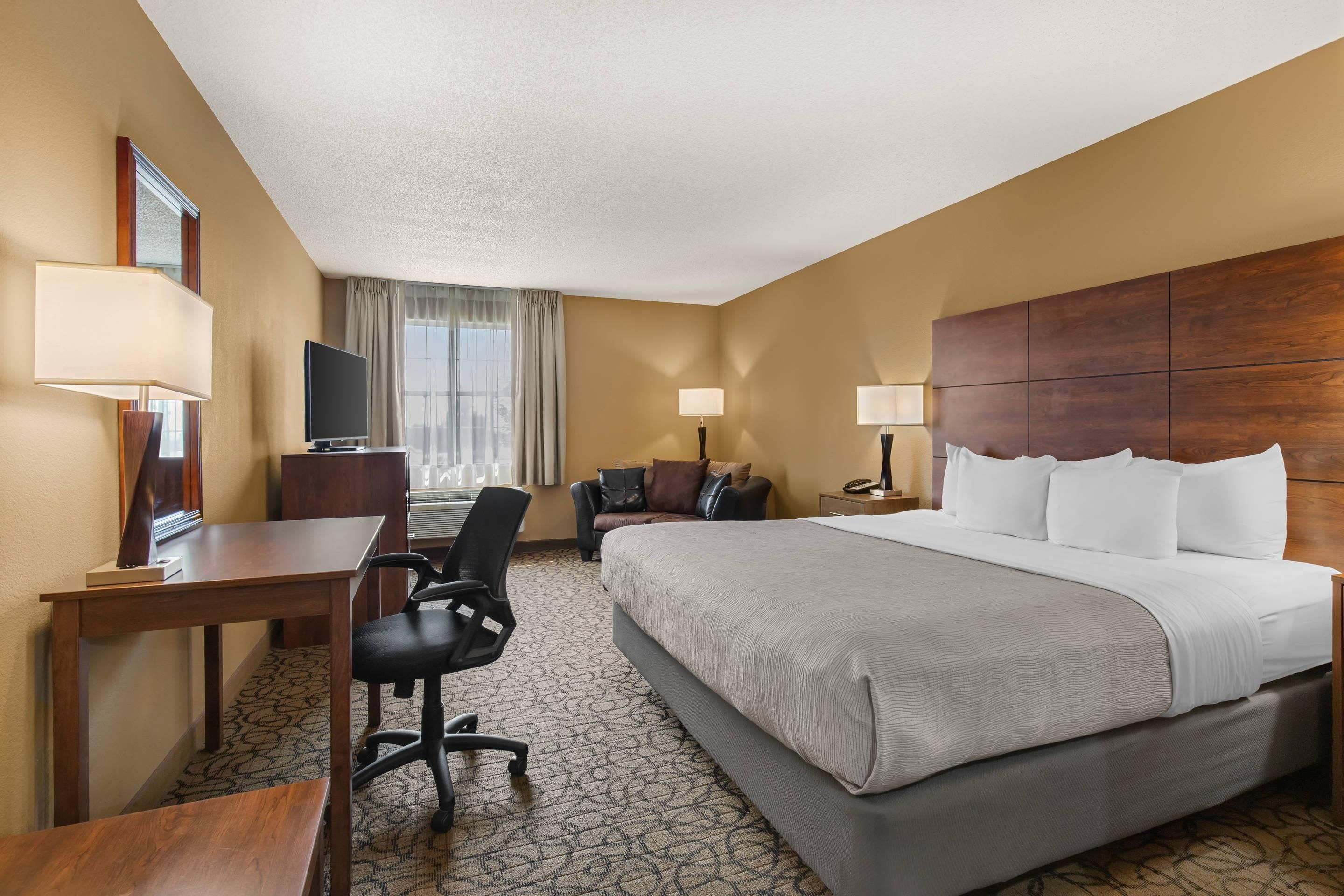 Standard Room, 1 King Bed, Non Smoking | Pillowtop beds, desk, laptop workspace, blackout drapes