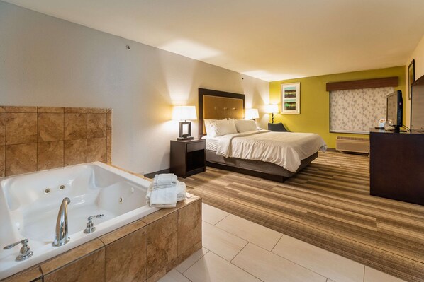 Room, 1 King Bed, Non Smoking, Jetted Tub | 1 bedroom, desk, blackout drapes, iron/ironing board