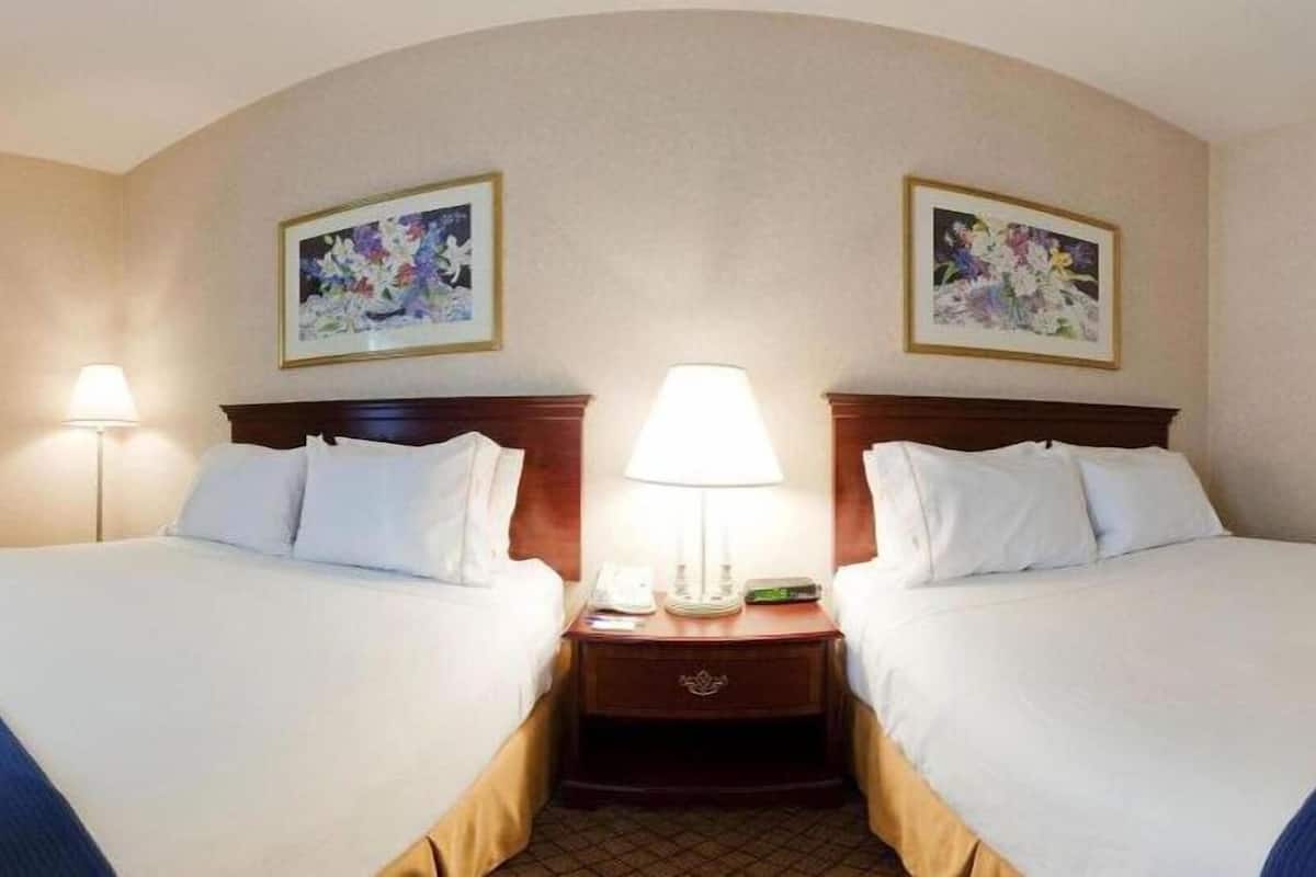 Premium bedding, down comforters, pillowtop beds, in-room safe