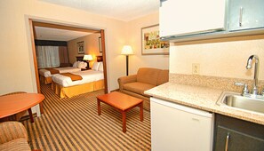 Suite, 2 Queen Beds (Additional Living Area) | Down comforters, desk, laptop workspace, blackout drapes