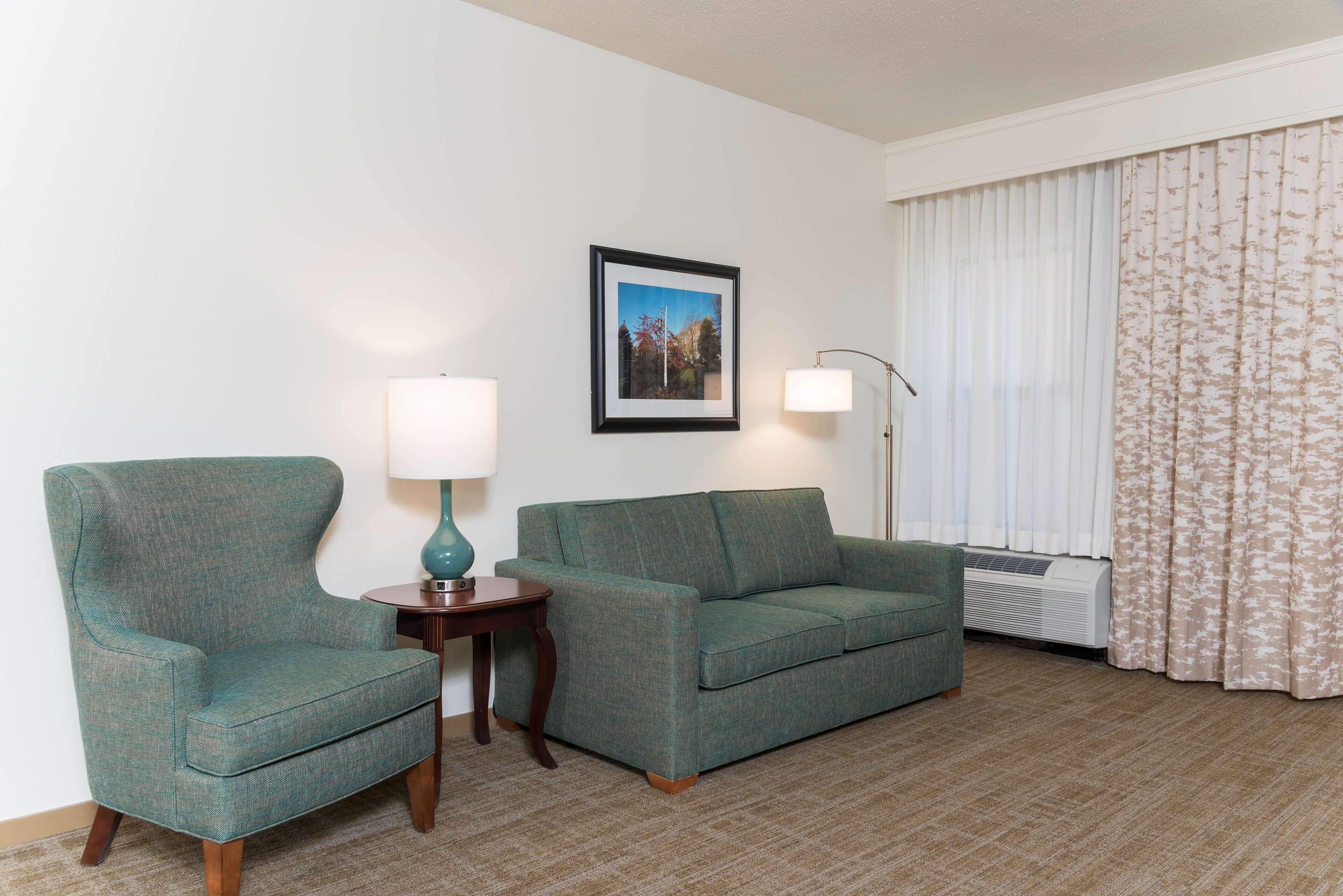 suite, 1 king bed with sofa bed, non smoking | living area | 32-inch lcd tv with cable channels, tv, pay films