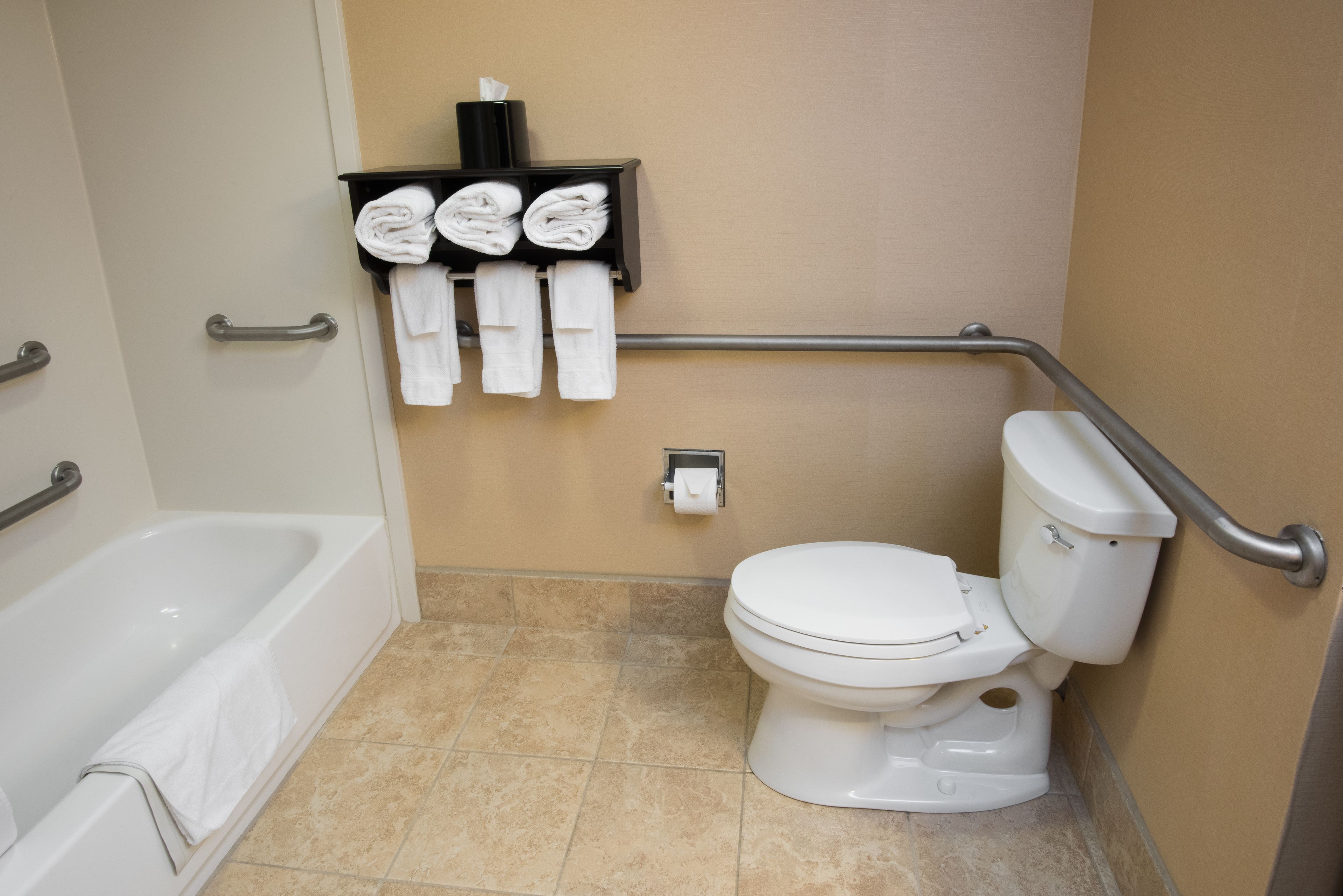 hydromassage showerhead, free toiletries, towels