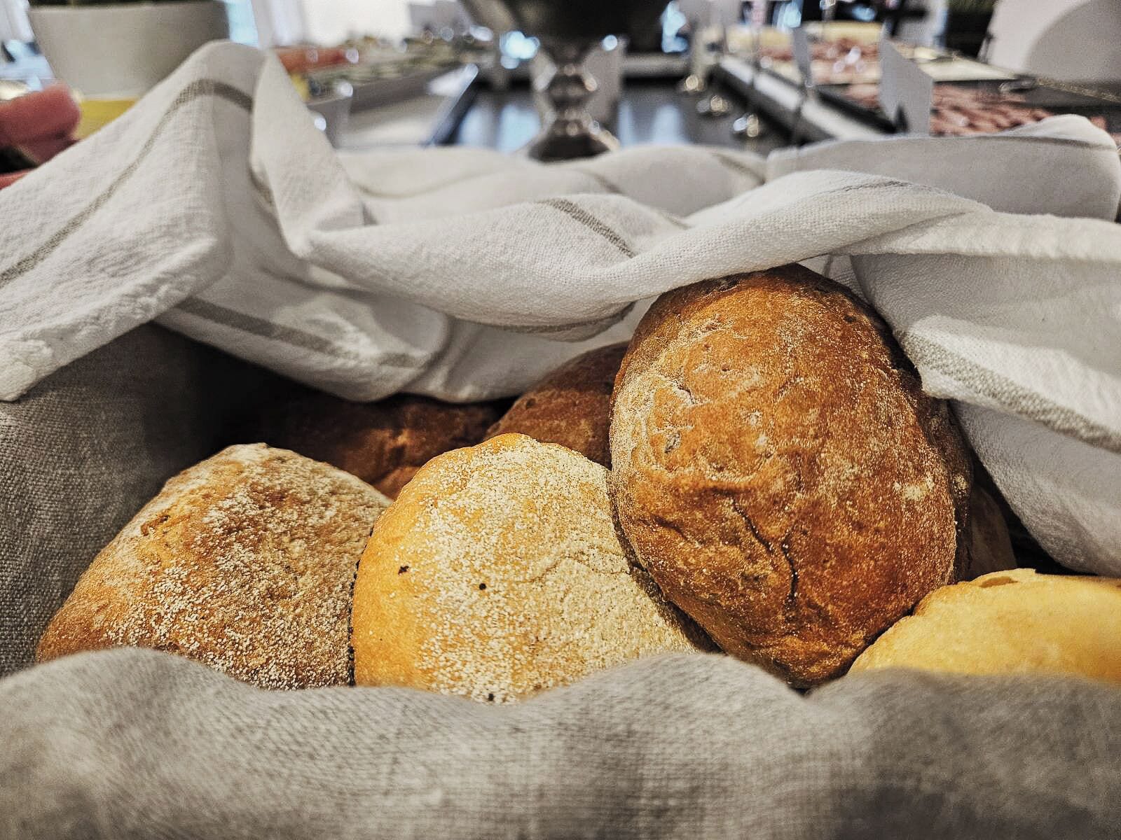 A basket of various breads.