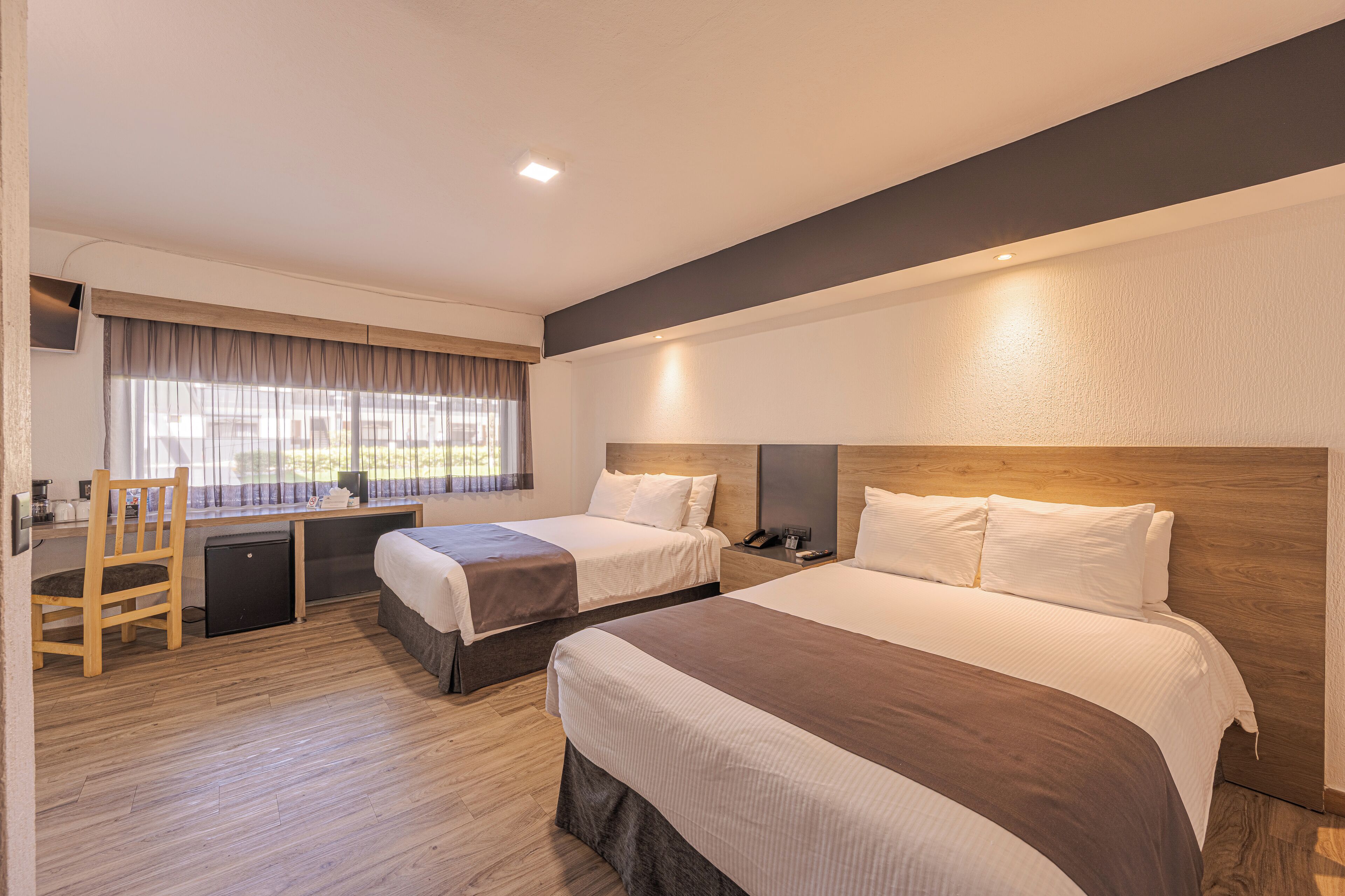 junior suite | minibar, in-room safe, desk, blackout curtains