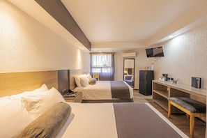 Standard Room, 2 Double Beds | Minibar, in-room safe, desk, blackout drapes