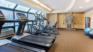 A gym with treadmills, elliptical machines, and exercise balls. - La Quinta Inn & Suites by Wyndham Boston Somerville (Somerville)