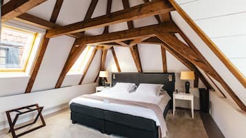 Luxury Suite, Garden View | Premium bedding, minibar, in-room safe, individually decorated