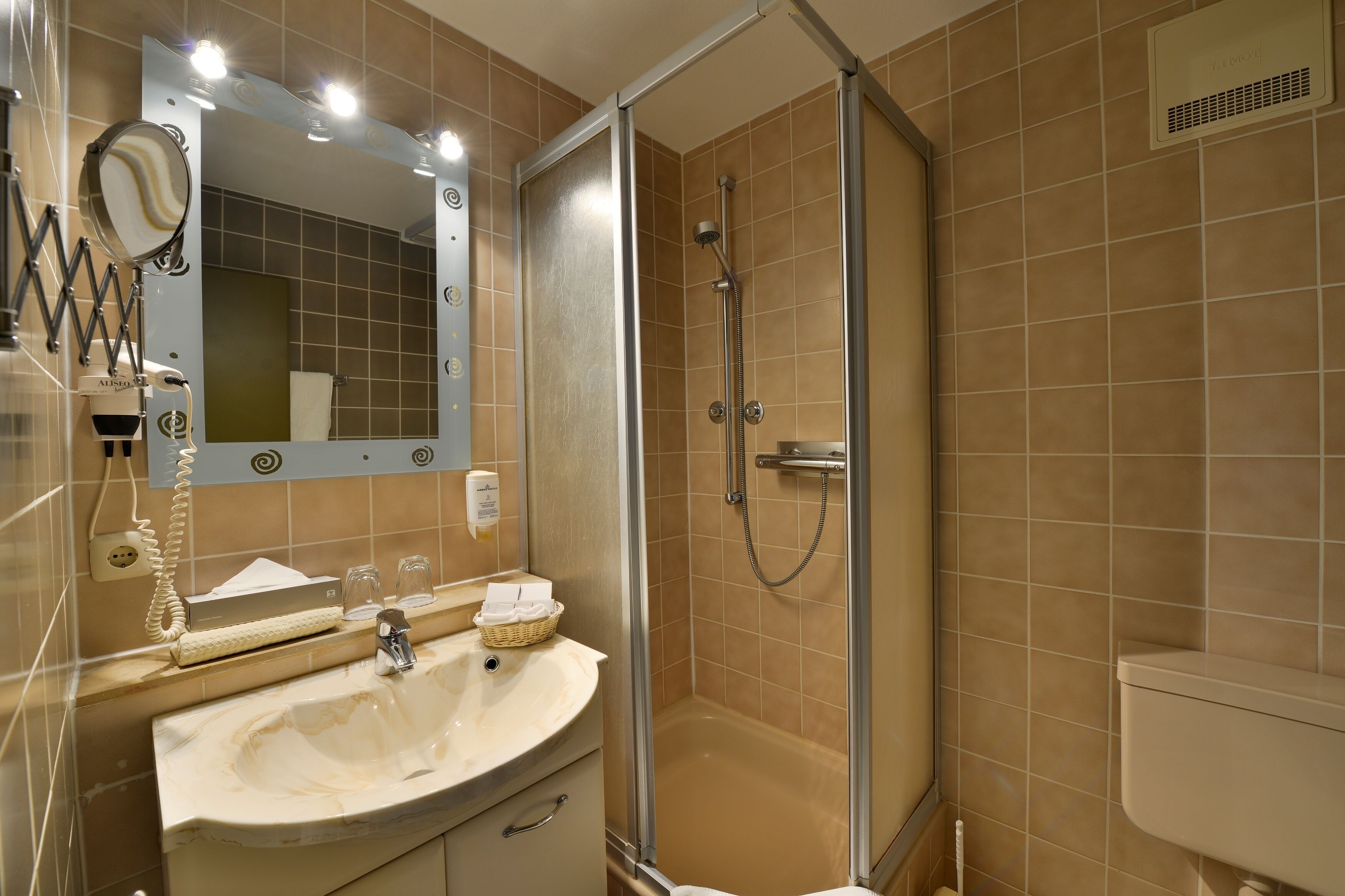 shower, free toiletries, hair dryer, towels