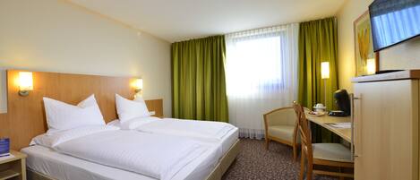 Hypo-allergenic bedding, desk, blackout curtains, rollaway beds