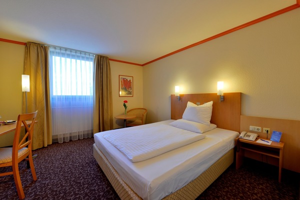 Hypo-allergenic bedding, desk, blackout curtains, rollaway beds