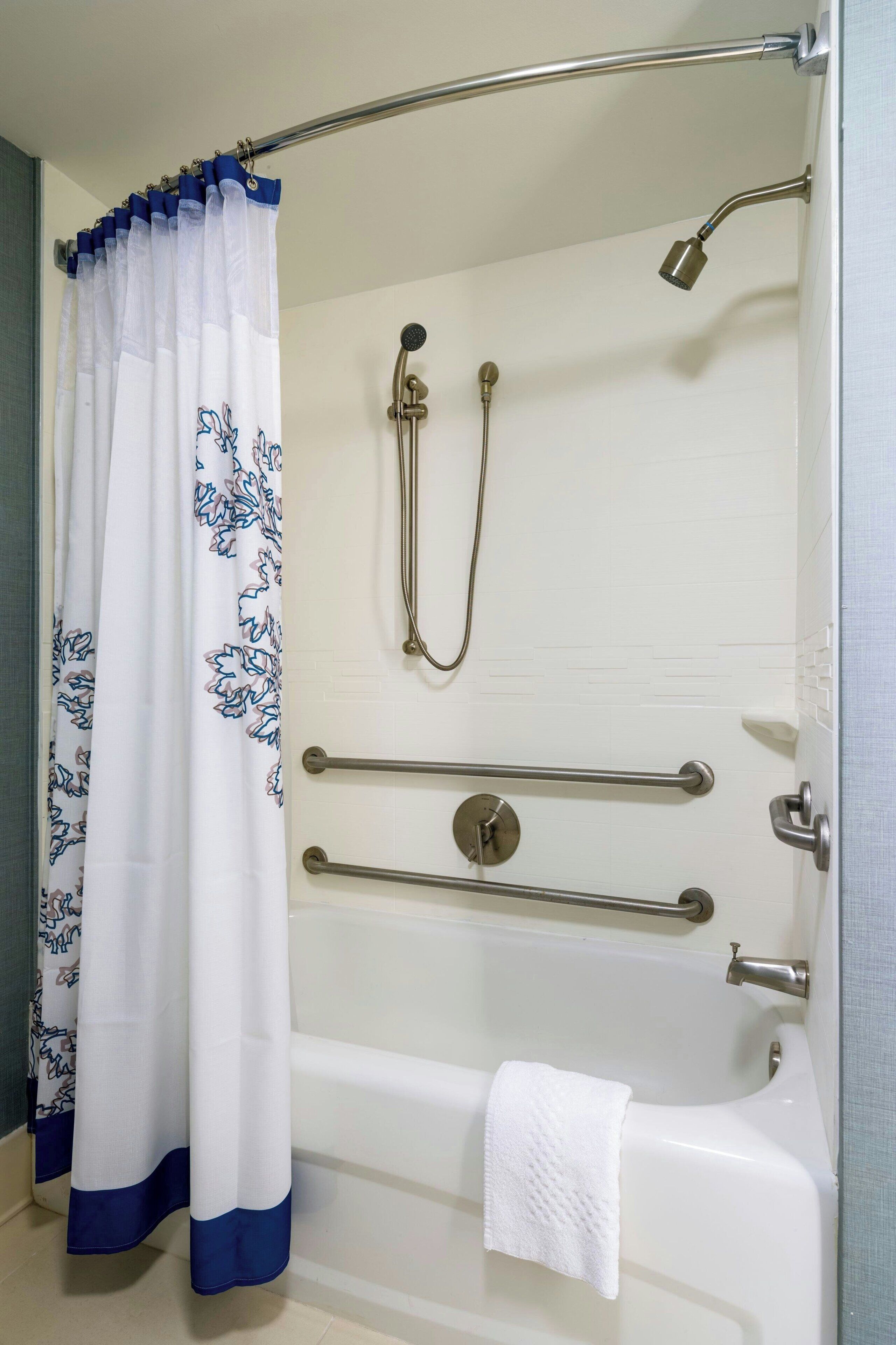 combined shower/bathtub, free toiletries, hair dryer, towels