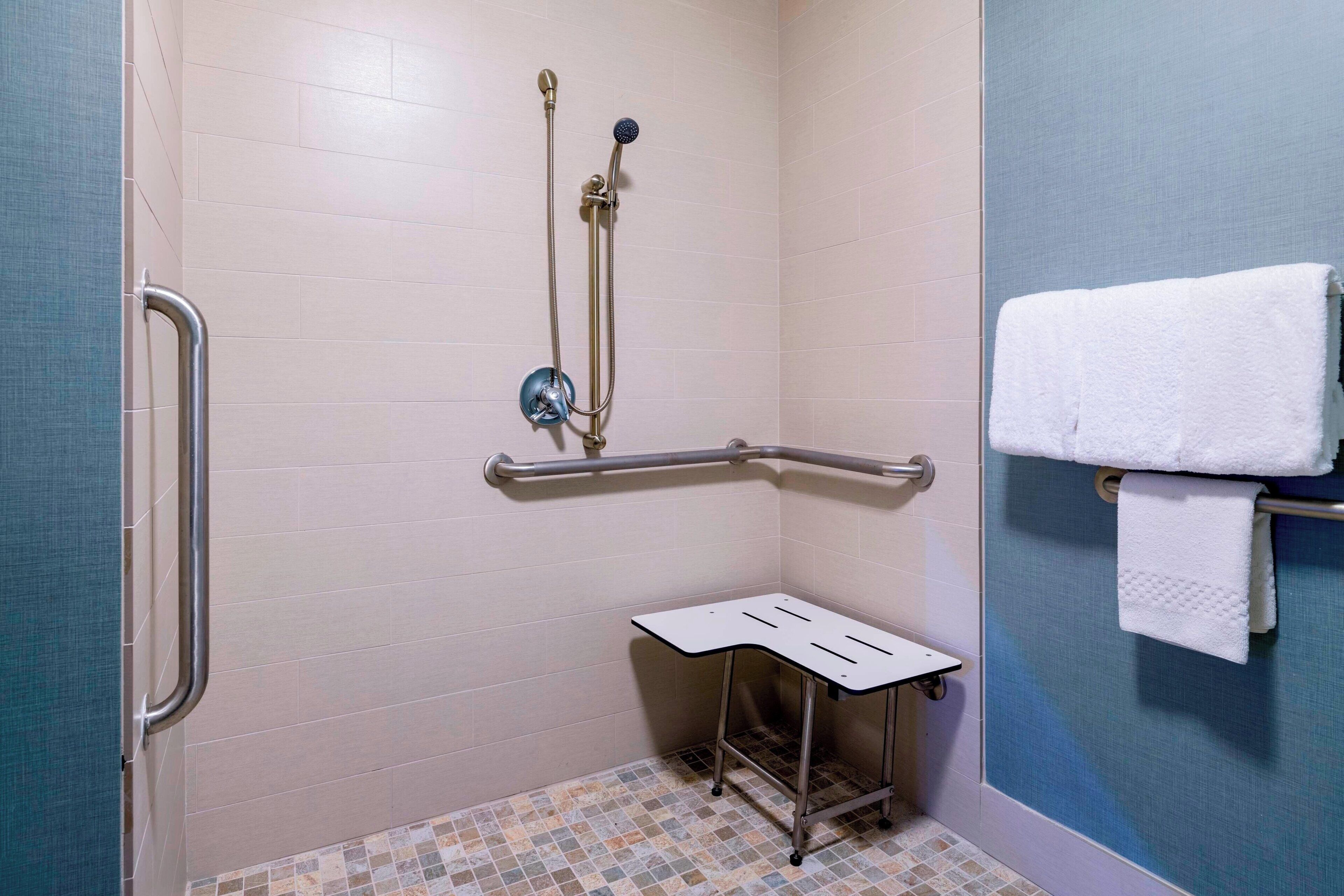 combined shower/bathtub, free toiletries, hair dryer, towels