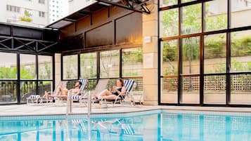 Indoor pool, open 9:00 AM to 10:00 PM, pool loungers