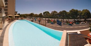 Indoor pool, outdoor pool, pool umbrellas, sun loungers