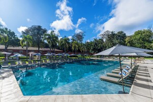 Outdoor pool, pool umbrellas, sun loungers