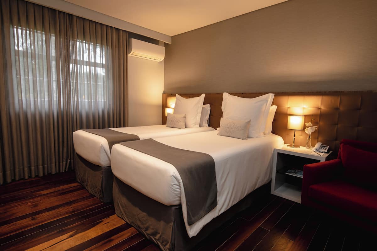 Premium bedding, pillow-top beds, minibar, in-room safe