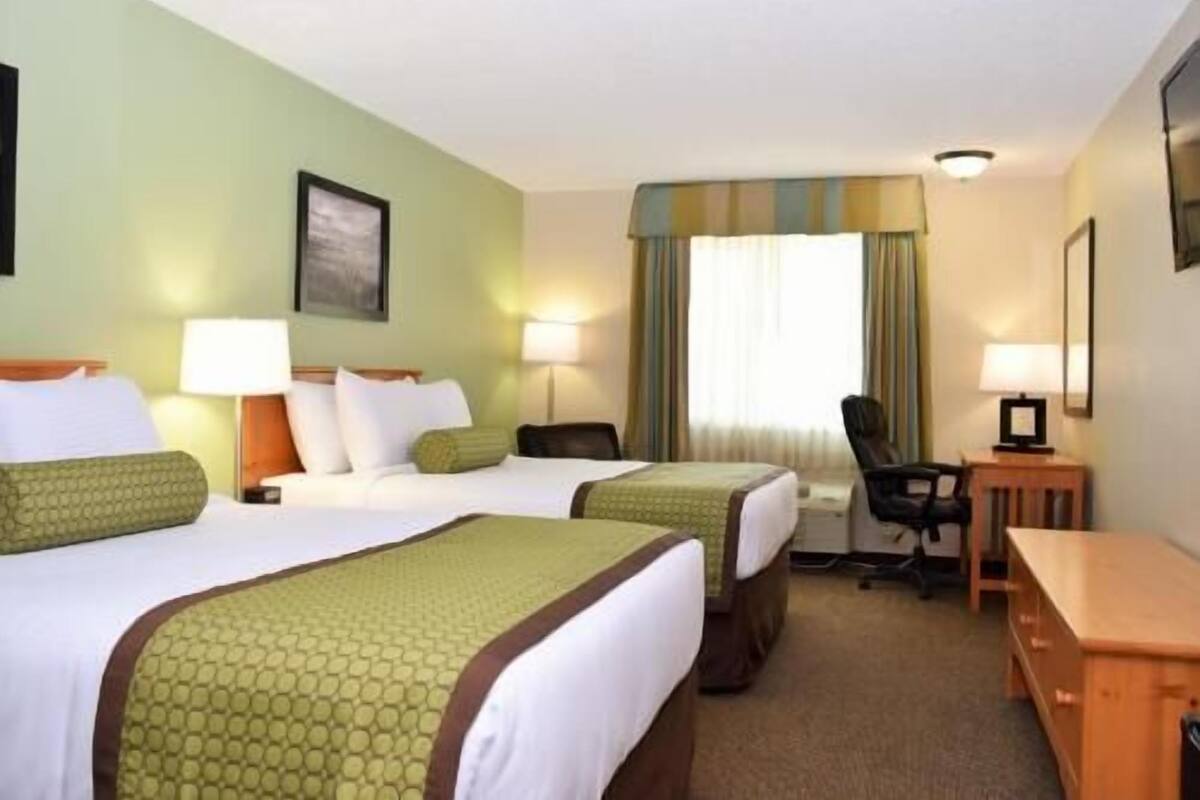 Premium bedding, pillowtop beds, desk, laptop workspace