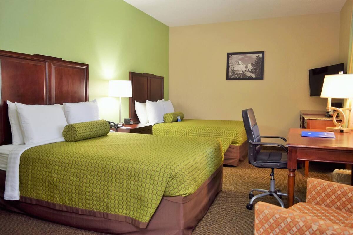Premium bedding, pillowtop beds, desk, laptop workspace
