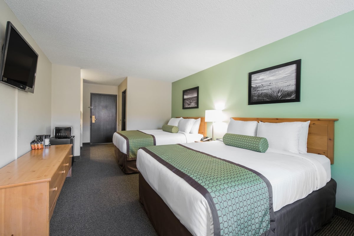 Premium bedding, pillowtop beds, desk, laptop workspace