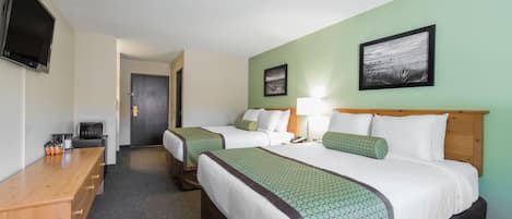 Premium bedding, pillowtop beds, desk, laptop workspace