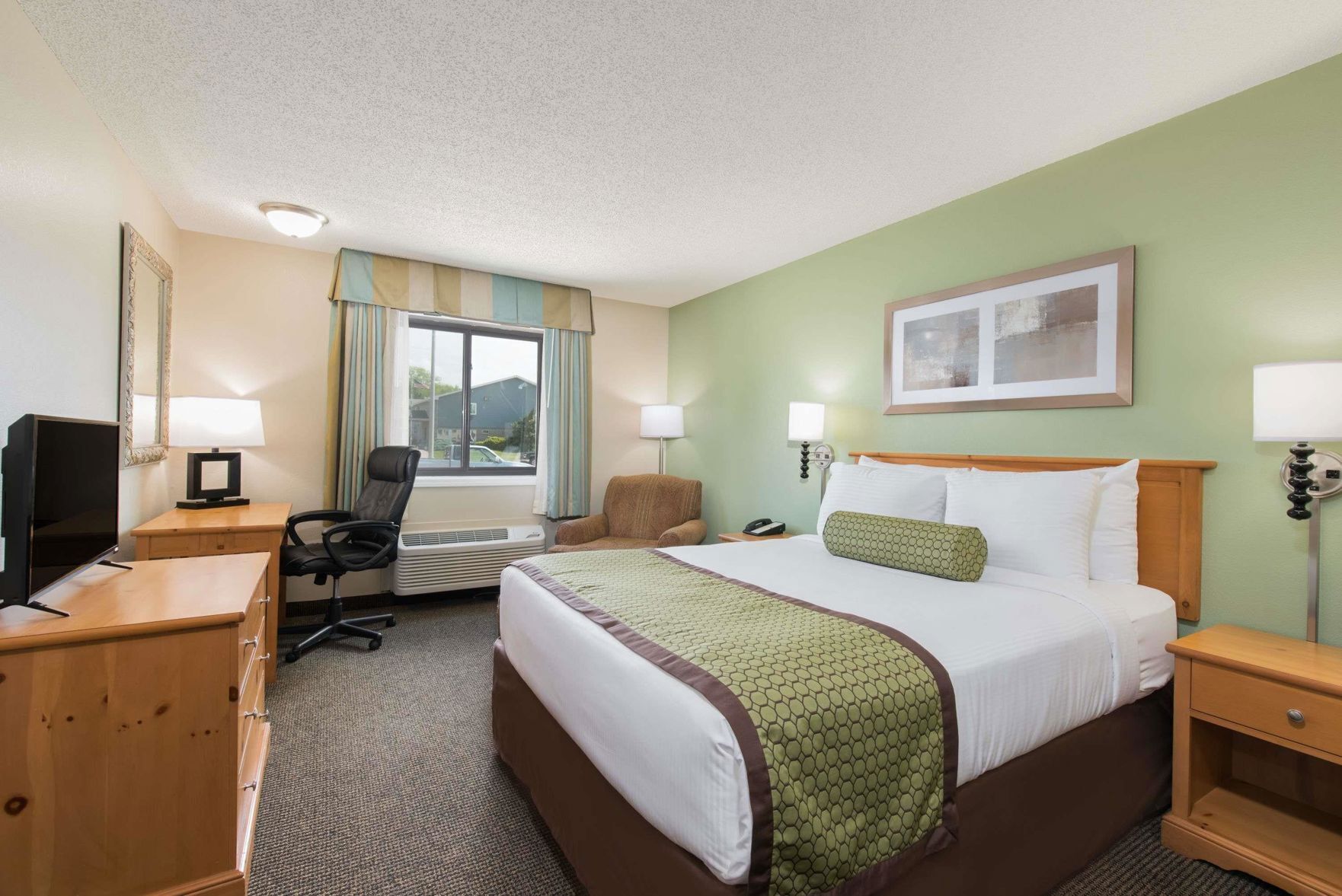 Premium bedding, pillowtop beds, desk, laptop workspace