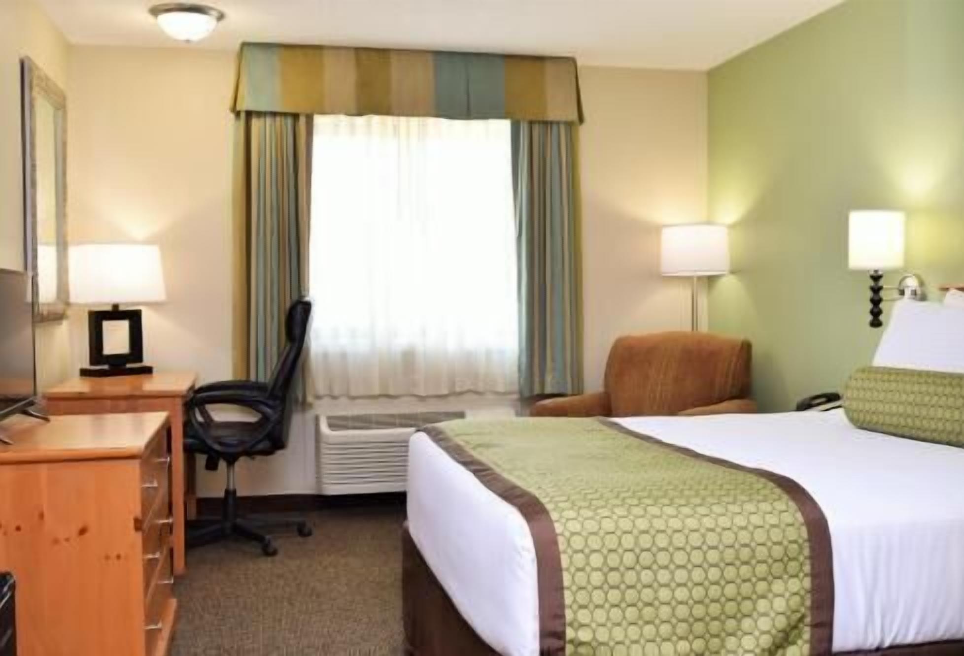 Premium bedding, pillowtop beds, desk, laptop workspace